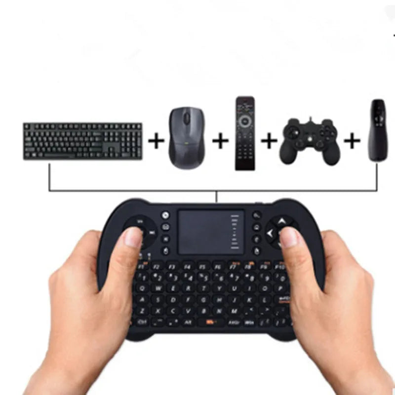 Black wireless QWERTY keyboard air mouse combo with touchpad, 146.8x97.5x19mm, on a table