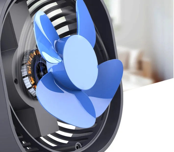 USB desk fan with 360-degree rotation in alarm clock style on a desk