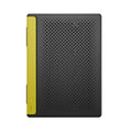 Portable black aluminium notebook stand folded flat next to a laptop
