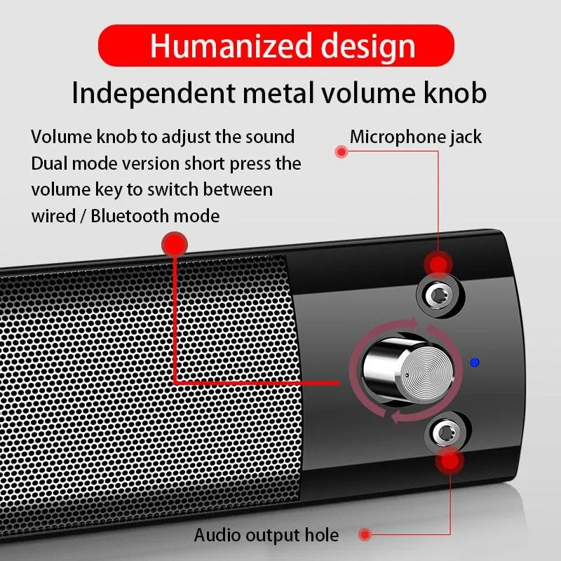 Small phantom black Bluetooth speaker subwoofer with dual speakers and microphone on a desk