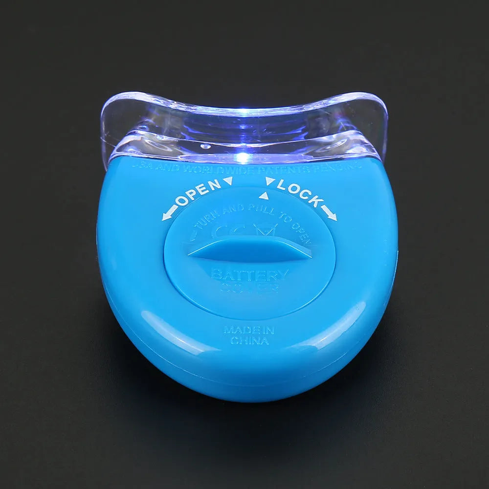 LED teeth whitening kit with wide edge tray and buckle denture system, available in blue, white, or red