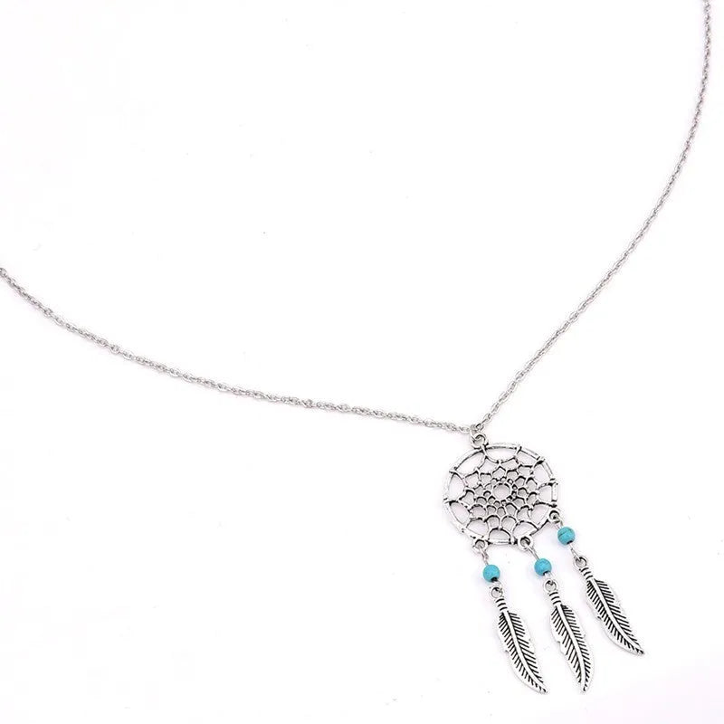Silver-tone dream catcher feather pendant necklace with woven hoop, turquoise bead, and 46cm chain