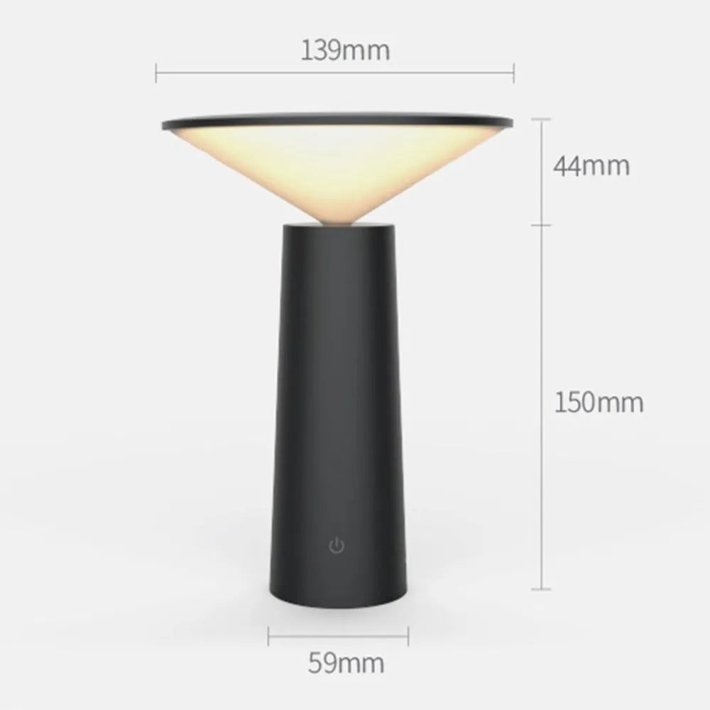 Black USB rechargeable LED desk lamp with touch sensor and adjustable lamp head on a wooden desk.