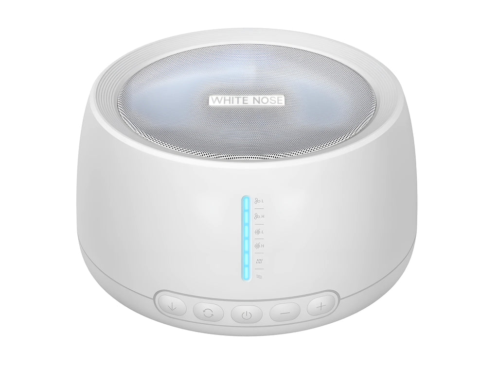 White noise sleep aid machine in white with compact 110mm dimensions on a bedside table