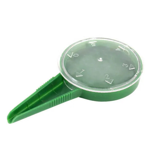 5-speed adjustable dial seed sower in transparent green plastic, approx 12cm long