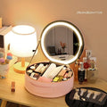 Round cherry blossom pink PU leather makeup bag with built-in LED mirror and internal partitions.