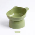 Oblique high foot pet bowl in PP for cats and dogs, shown in one of four colours: rouge pink, deep sea blue, lemon yellow or green grass green.