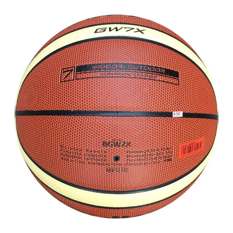 Orange size 7 training basketball with wear-resistant particle skin on an indoor court floor