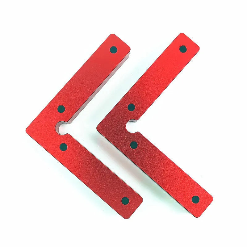 Solid aluminium right angle woodworking positioning block with measurement scale, shown with clamps and jigsaw.