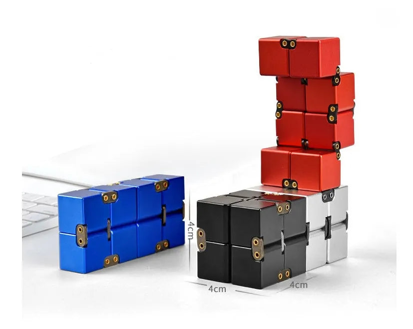 Zinc alloy infinity cube fidget toy showing black and silver colour options, sized at 4cm.