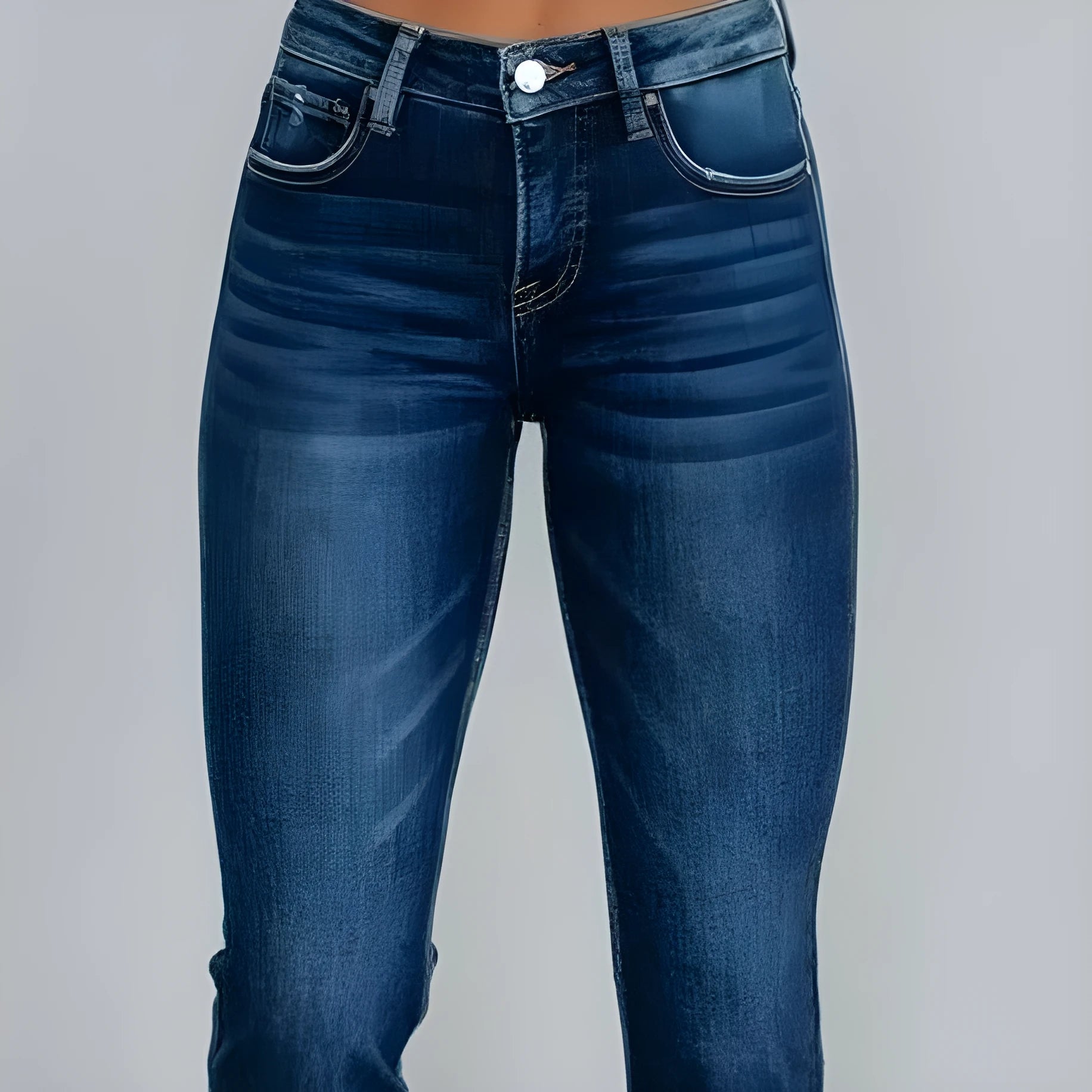 Women's solid colour denim jeans with hand-worn distressing in dark blue, laid flat.