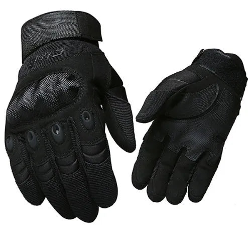 Tactical half-finger gloves with rubber knuckle guards in black colour on a dark background