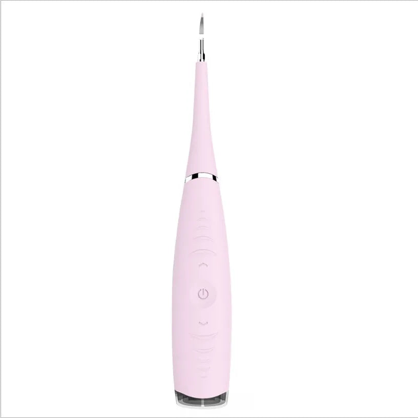 Pink and blue waterproof electric dental scaler with silicone handle and charging cable on a bathroom counter.