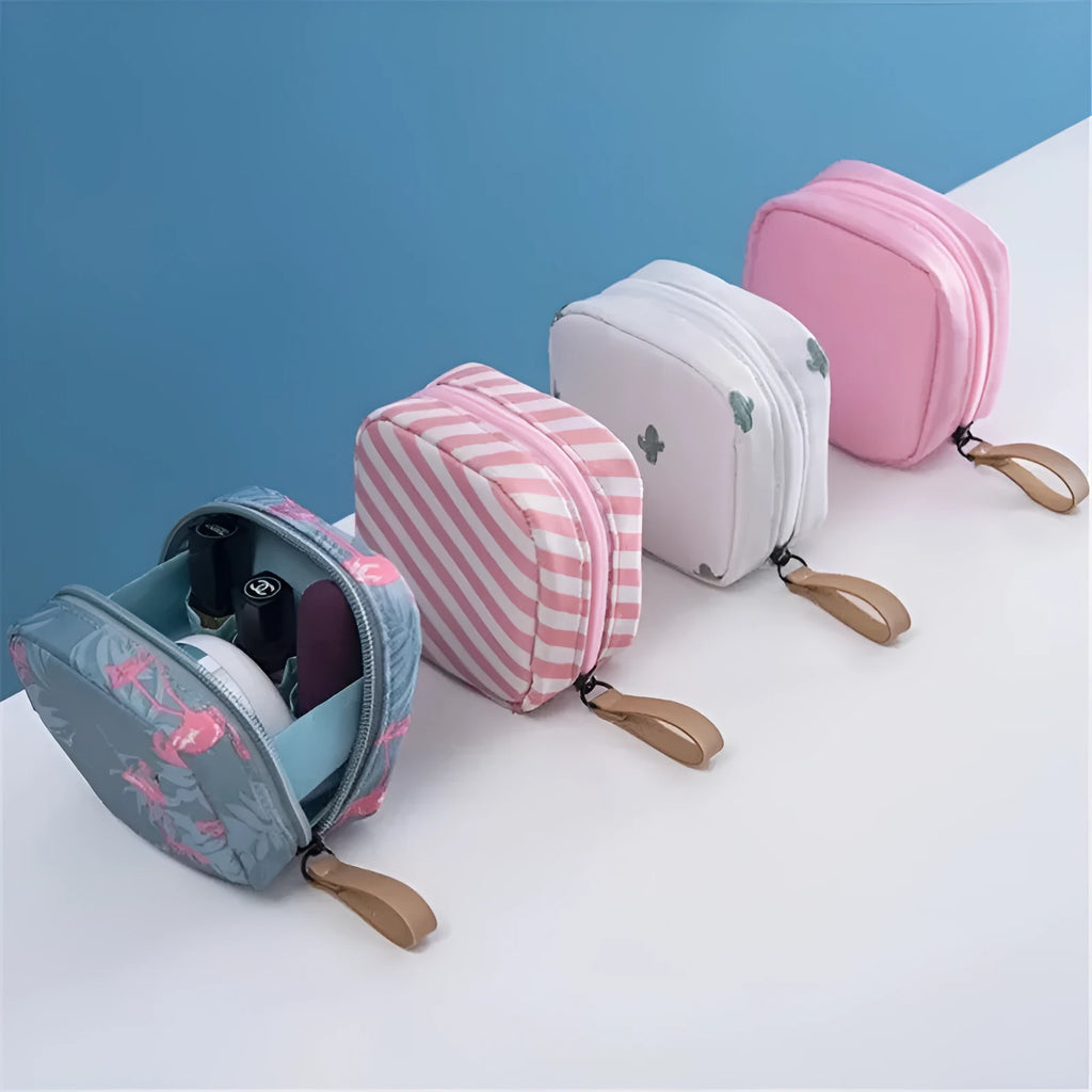 Blue cloth cube-shaped makeup storage bag with a plain pattern on a white background.
