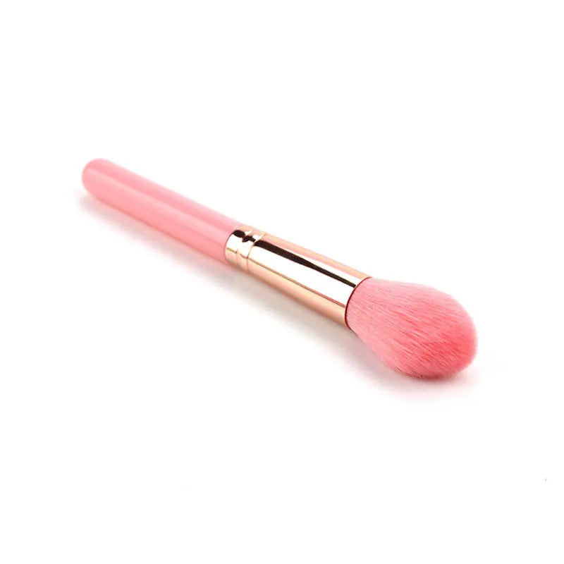 Pink blush brush with corrugated silk nylon wool bristles and plastic handle for highlight application