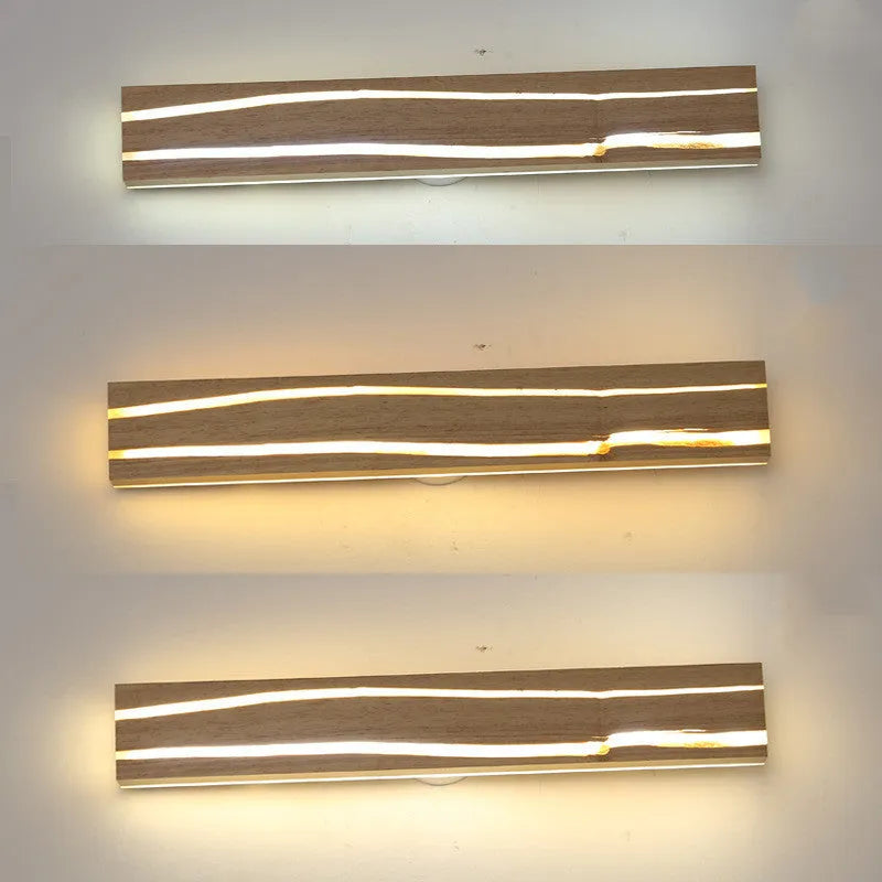 Solid wood LED wall light in log colour with rubber wood frame and acrylic panel