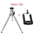 Mini flexible aluminium desktop tripod with ball head extended, alongside a universal U-shaped black phone clip.