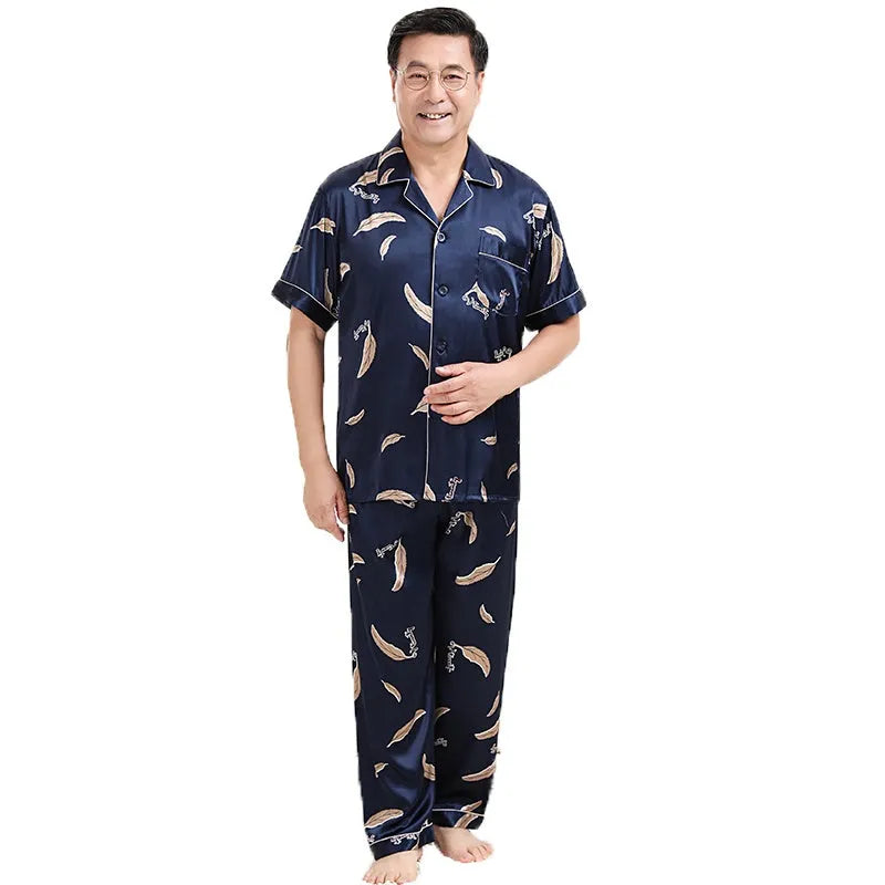 Men's ice silk pyjama set with front button top, small lapel collar, plant flower print, short sleeves and long trousers.