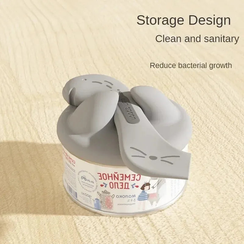 Silicone pet food spoon and airtight can lid set in grey, pink, or yellow for dog and cat wet food.