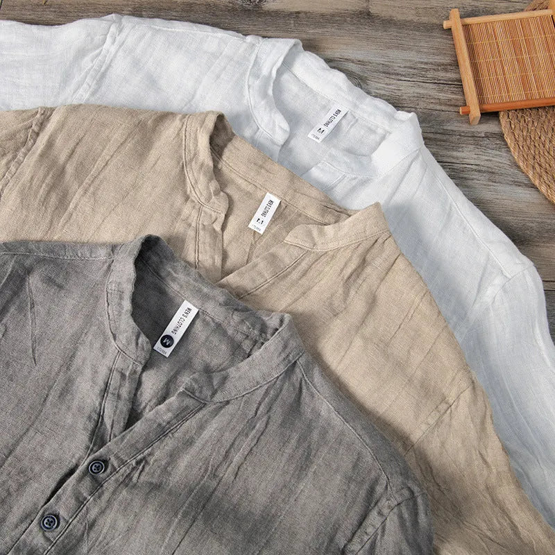 Men's grey linen short sleeve pullover top on a hanger