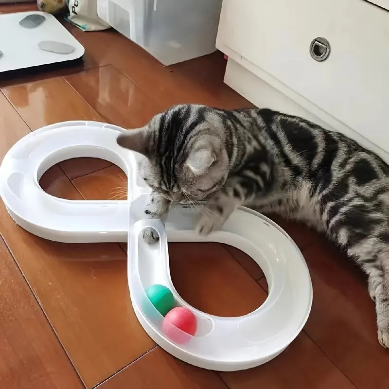 Blue and white self-moving cat turntable track toy with teasing stick for interactive play.