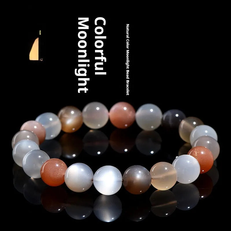 Natural colourful moonlight moonstone bracelet with 8mm single circle beads on a wrist.