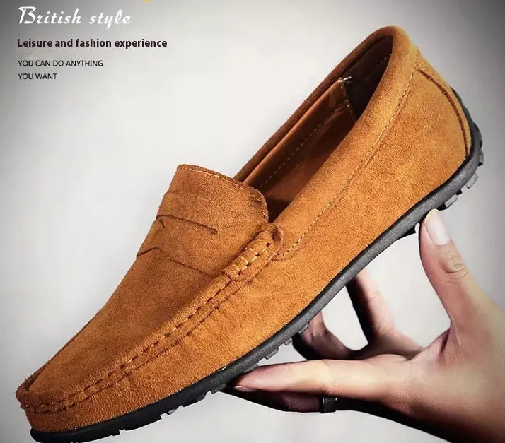 Men's brown suede Gommino-style low-top casual shoes with a round toe and flat rubber sole.