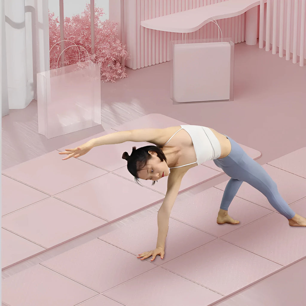 Folded and unfolded blue TPE gymnastic mat on a wooden floor