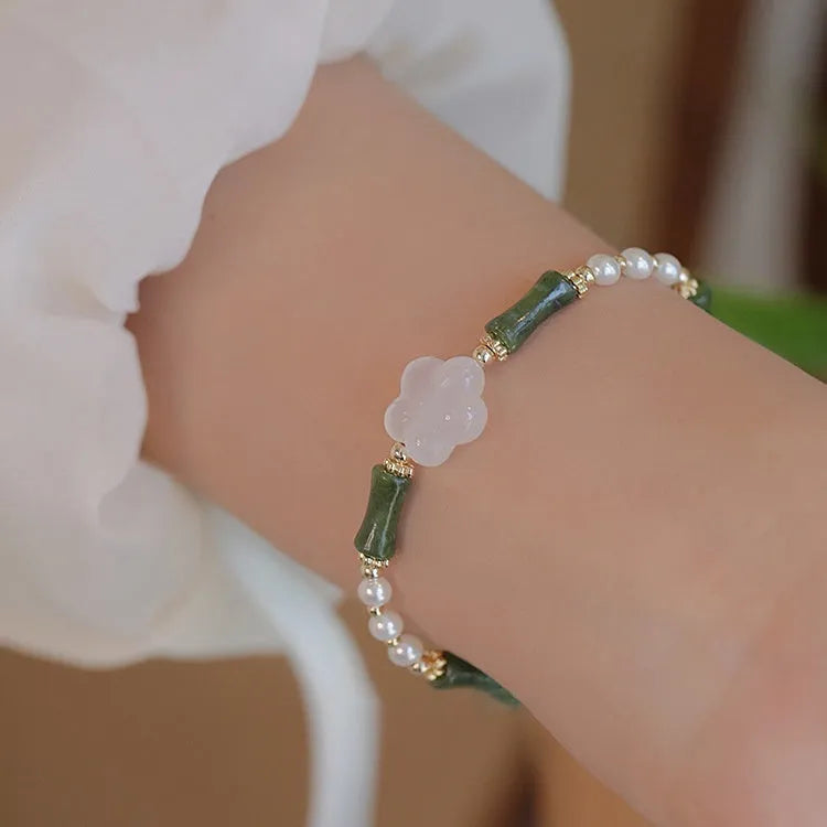 Women's Chinese style Hetian jade bracelet with bamboo joint design and shell pearl beads