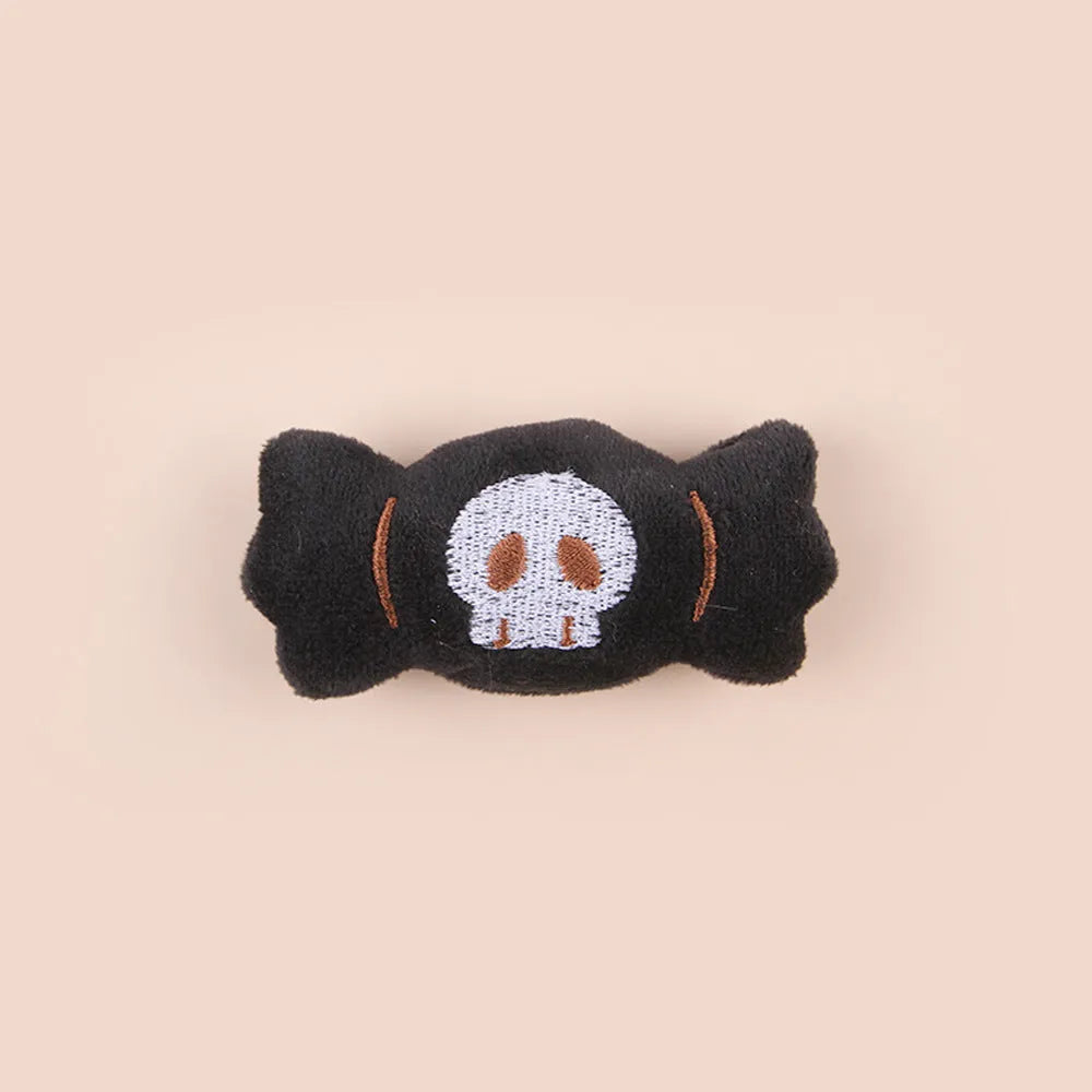 Small plush cat teaser wand with colourful candy design dangling attachment