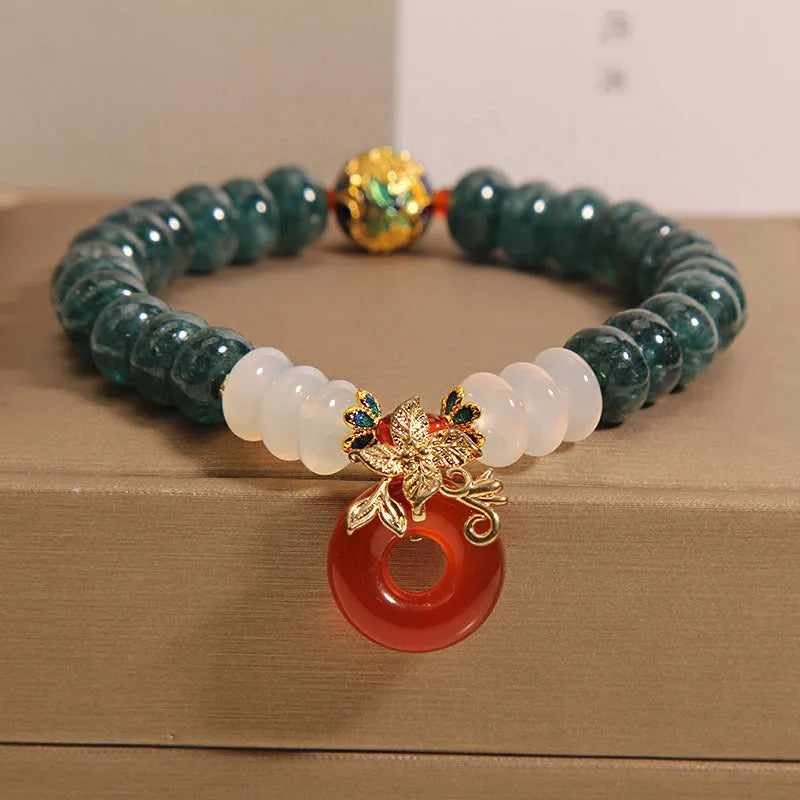 Blue water jade and red agate peace buckle crystal bracelet for women.