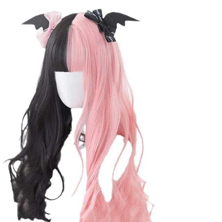 Harajuku Lolita long curly black and pink synthetic cosplay wig with bangs on a stand.