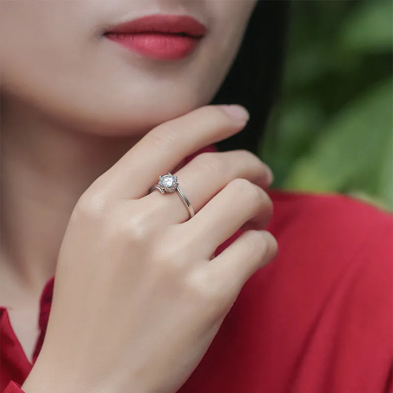 S925 silver platinum-plated moissanite ring in round geometric shape on white background