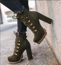 Women's suede high heel ankle boots with thick heel, round toe, and buckle detail in four colour options