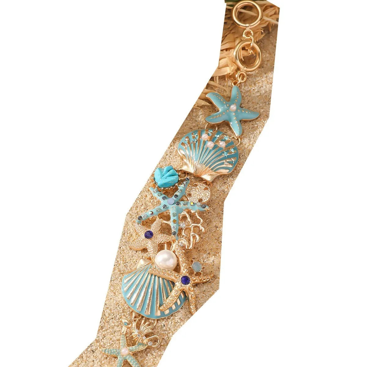 Women's alloy bracelet with starfish, star, and anchor design in turquoise, red, or blue colour.
