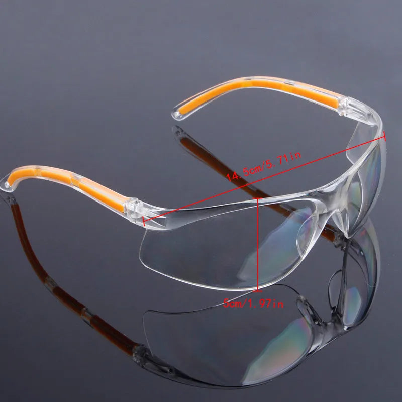 Transparent labour protection safety goggles with yellow frame for industrial and laboratory eye protection