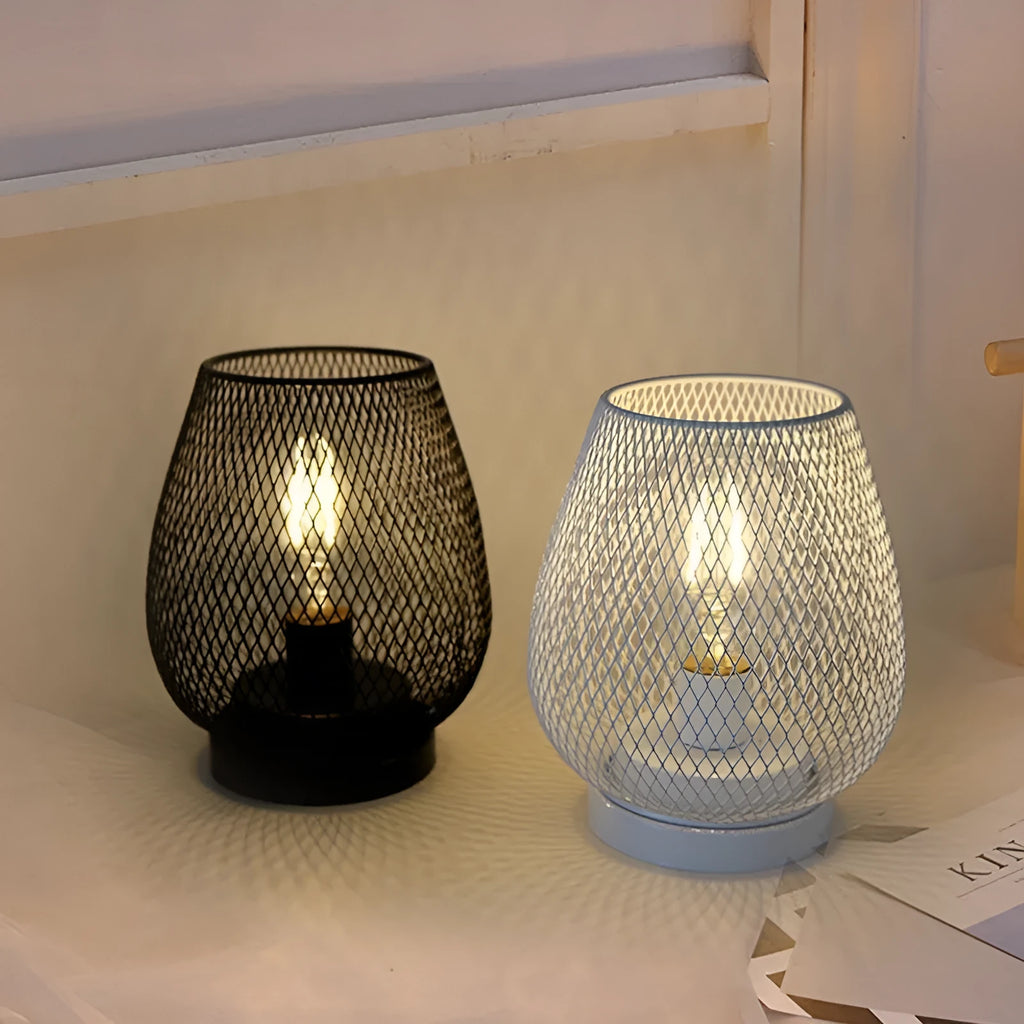 Retro iron art battery powered birdcage table lamp with warm light on bedside table