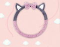 Cute cat ear steering wheel cover in short plush cashmere wool, black colour, on a steering wheel