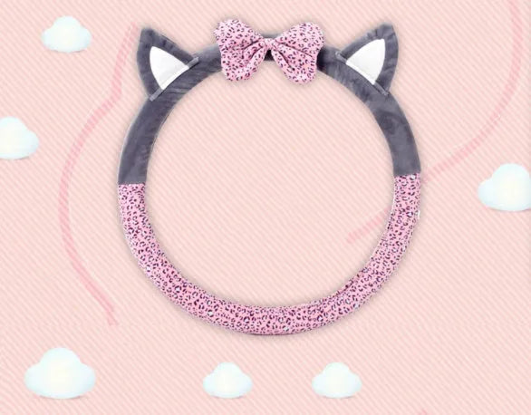 Cute cat ear steering wheel cover in short plush cashmere wool, black colour, on a steering wheel