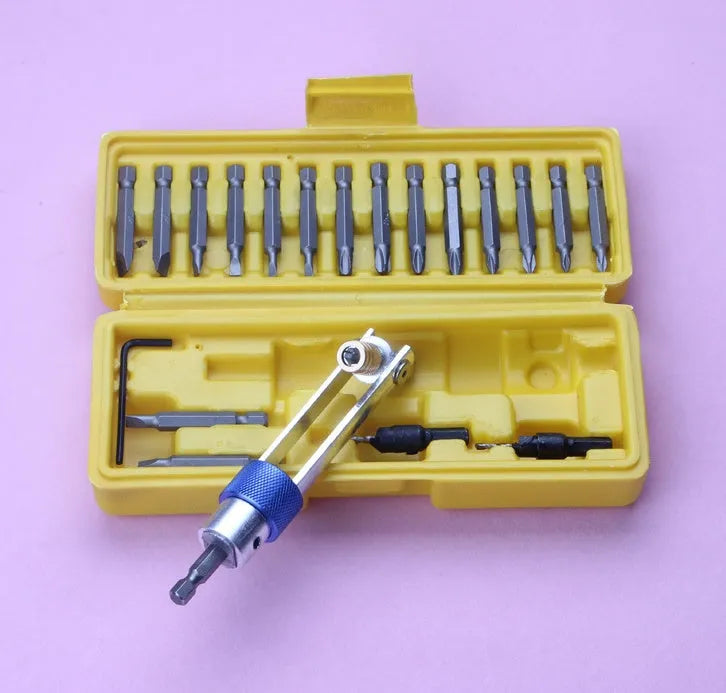 Half Time Drill driver with swivel head next to set of 18 Phillips, flathead, and countersink bits