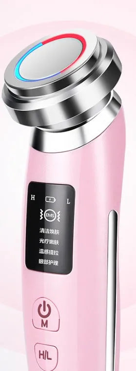 Pink portable skin rejuvenation and facial cleansing beauty instrument showing its compact size.