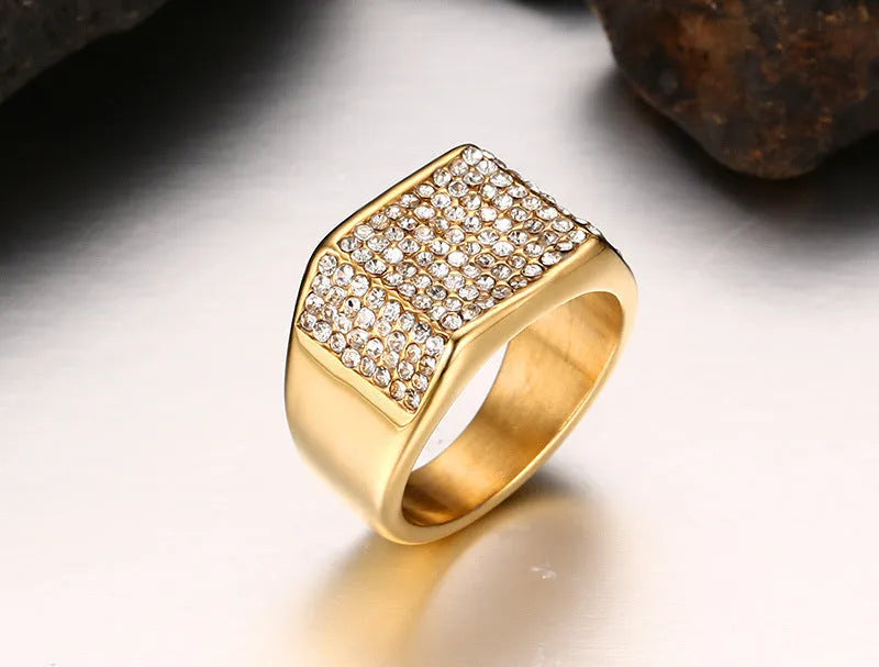 Gold titanium steel men's ring with geometric diamond-treated surface, available in sizes 7 to 12.
