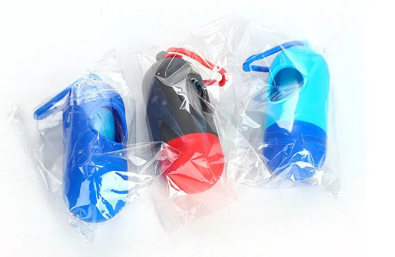 Roll of plastic dog poop bags in assorted colours, size 22.5 by 30 centimetres.