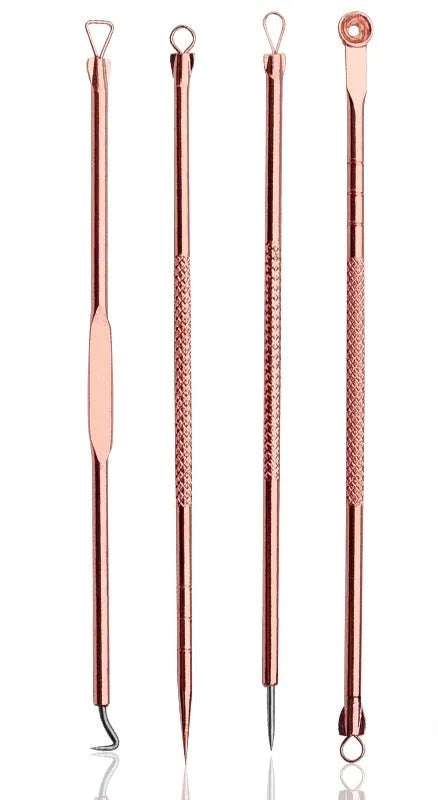 Gold rechargeable electric face cleanser with two brush heads for blackhead removal and deep cleaning
