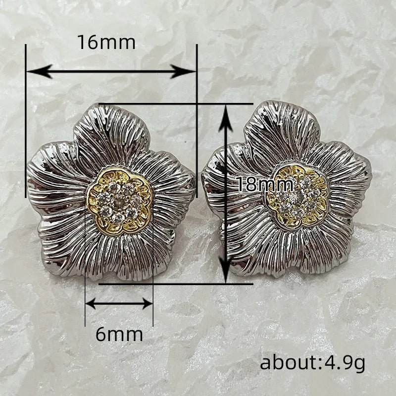 Retro textured gardenia stud earrings with two-tone electroplated finish on copper construction