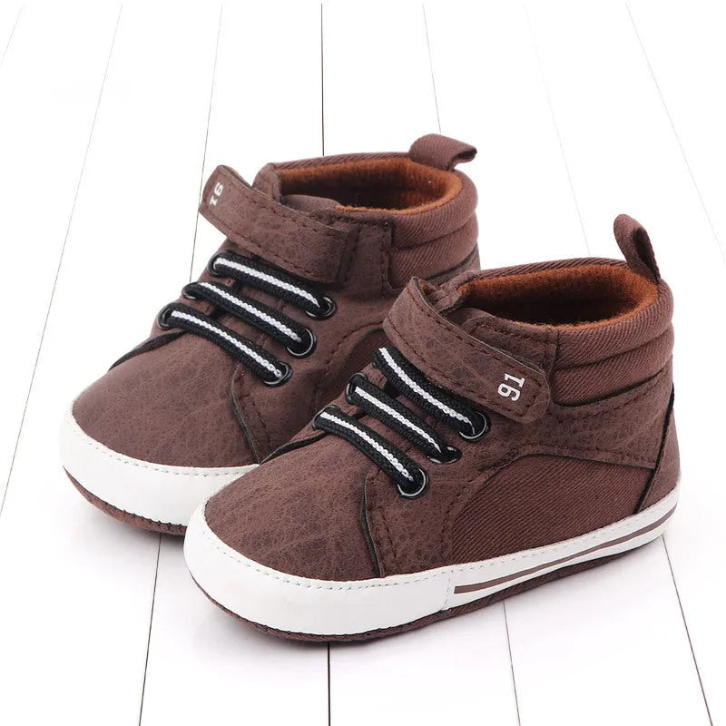 Blue high-top cotton toddler shoes for boys with Velcro fastening on a non-slip sole