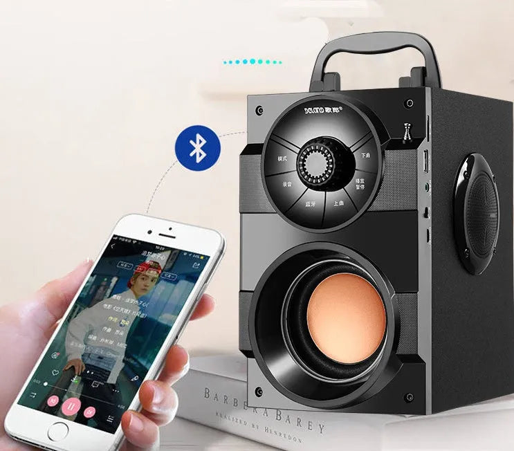 Black portable mini home audio system with subwoofer, USB cable, and 1.2m audio cable.