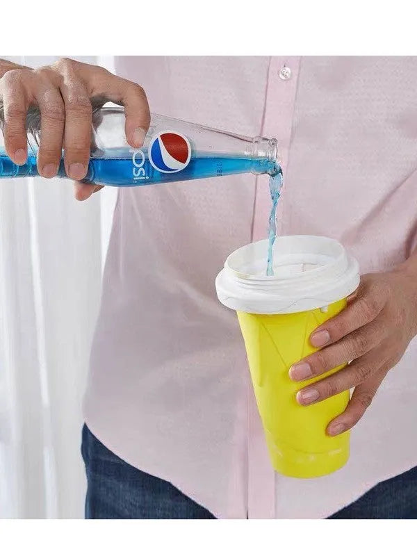 Blue cylindrical silicone pinch cup for making instant slushy smoothies.