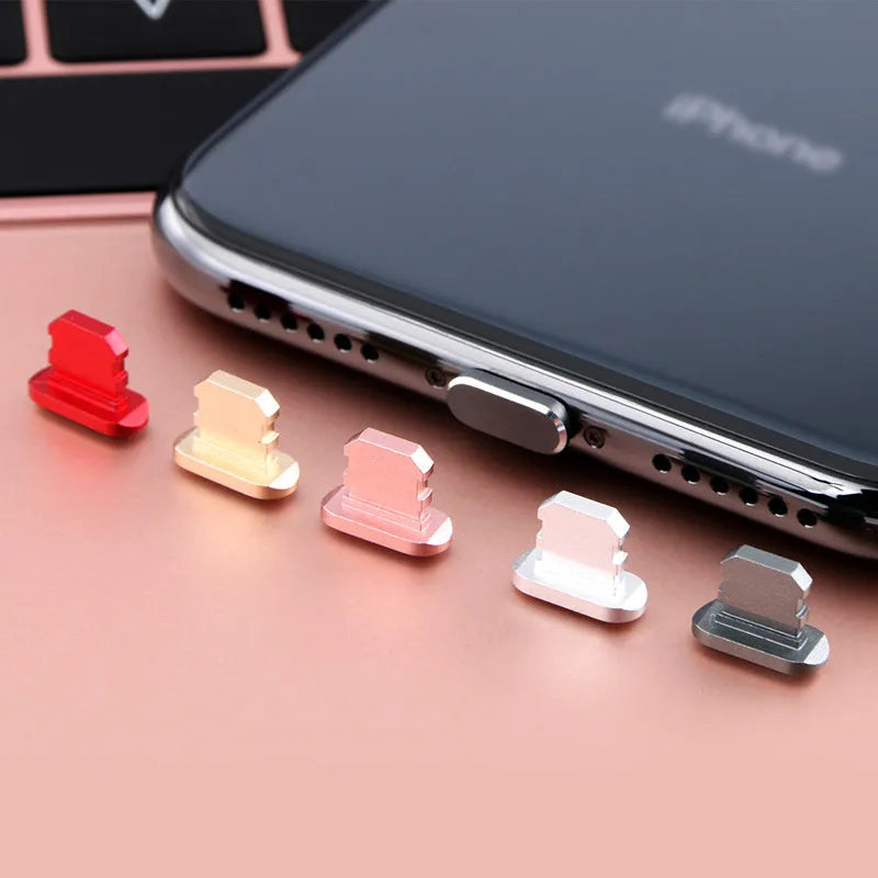 Aluminium alloy dust plug for iPhone Lightning charging port in various metallic colours.