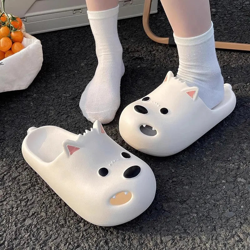 White and black women's EVA puppy slippers with toe cap sandal design showing injection moulded soles